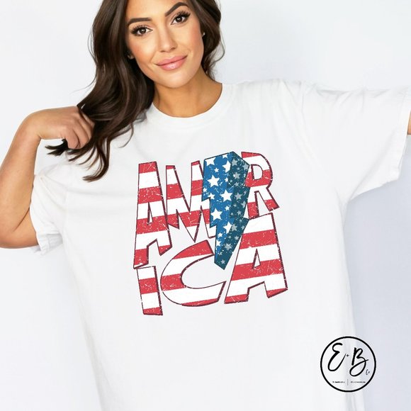 Trendy Patriotic America Stars Stripes Lightning Bolt USA July 4th Graphic Tee - Picture 1 of 5